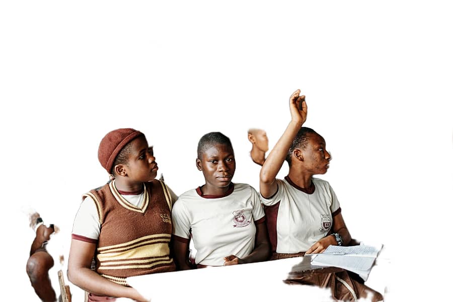 students with hands raised